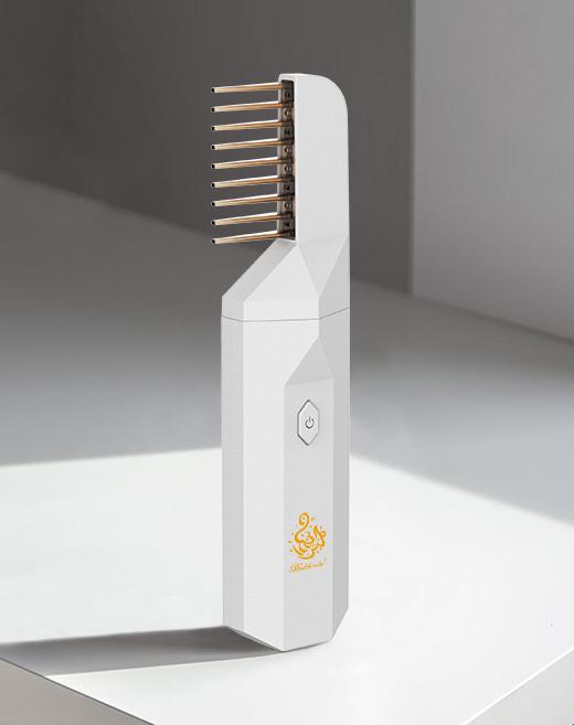white electric bakoor burner. Use bakhoor without burning coal. Handheld white stylish bakhoor burner with comb attachment